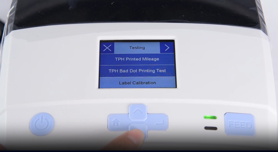 A:n close-up of a machine's digital interface showing a testing menu.